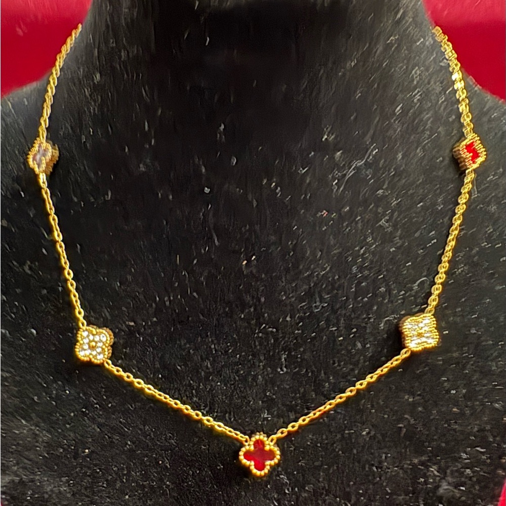 Beautifully crafted red cz and pave stone micro clover necklace; 18k plated!